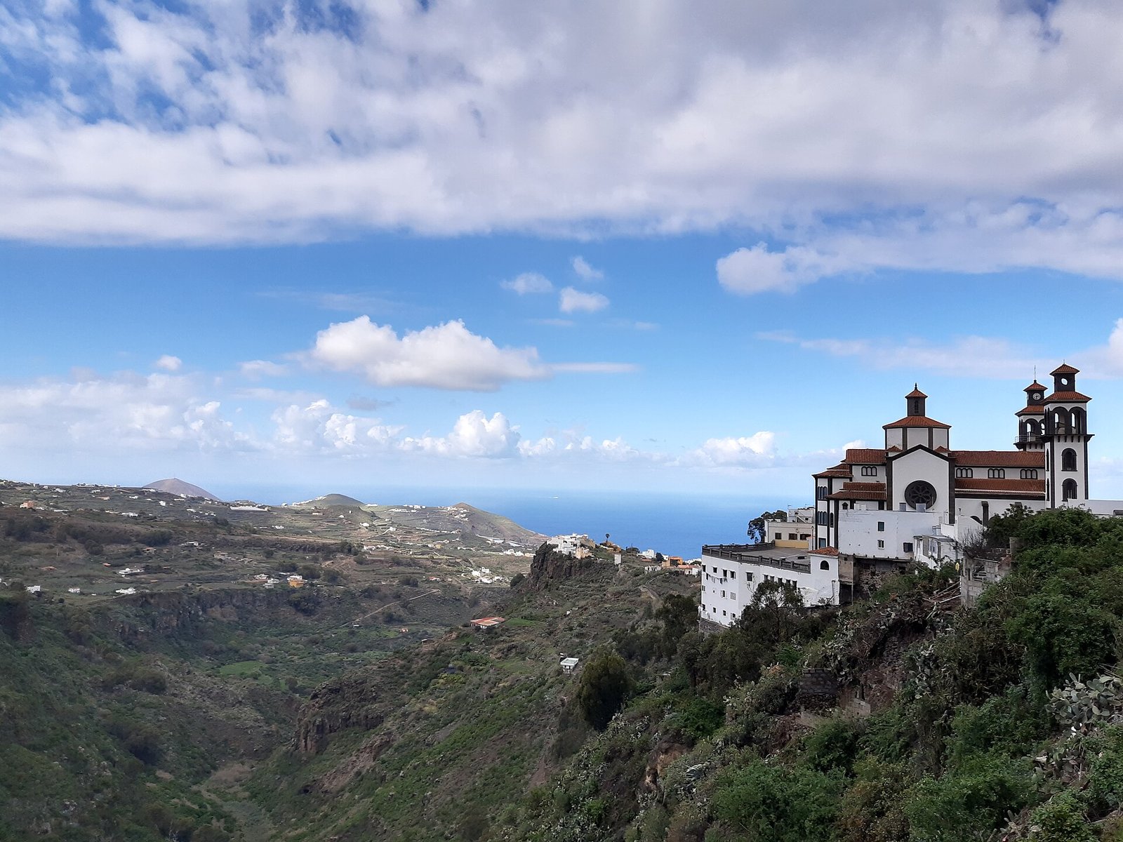 A traditional stone wine press in a green landscape in Gran Canaria