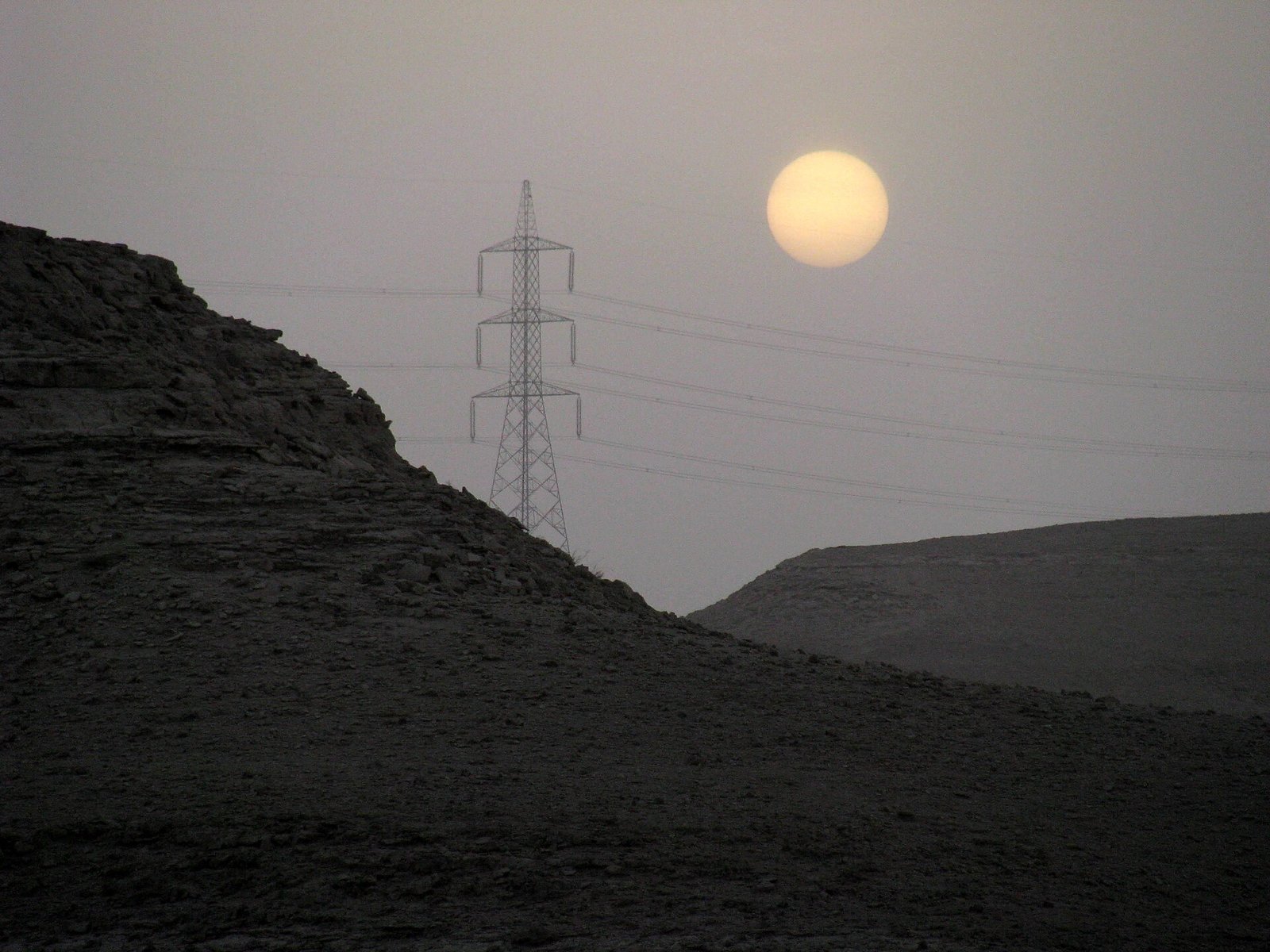 Power lines against a hazy sky in Gran Canaria