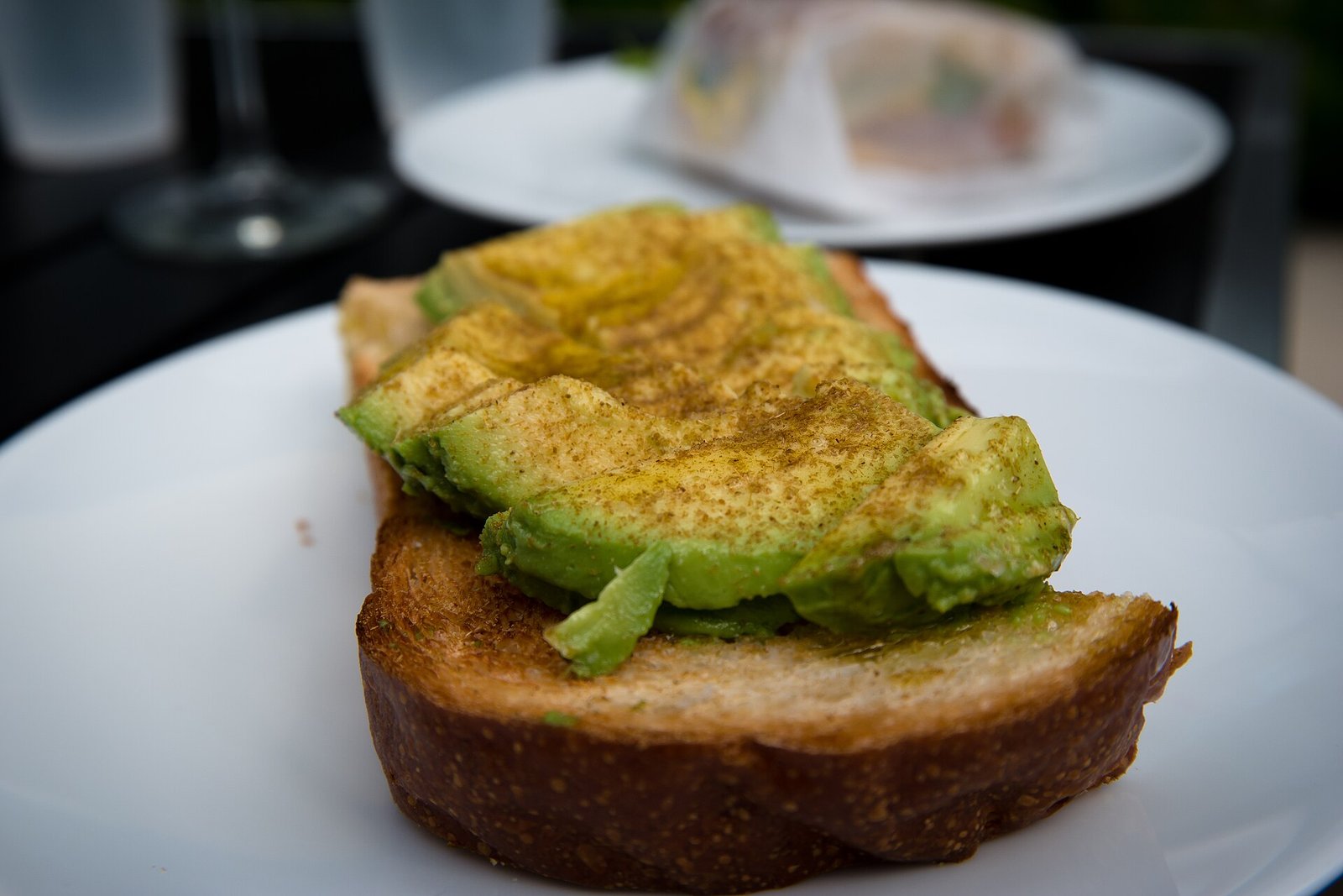 Avocado toast and coffee in a specialty cafe