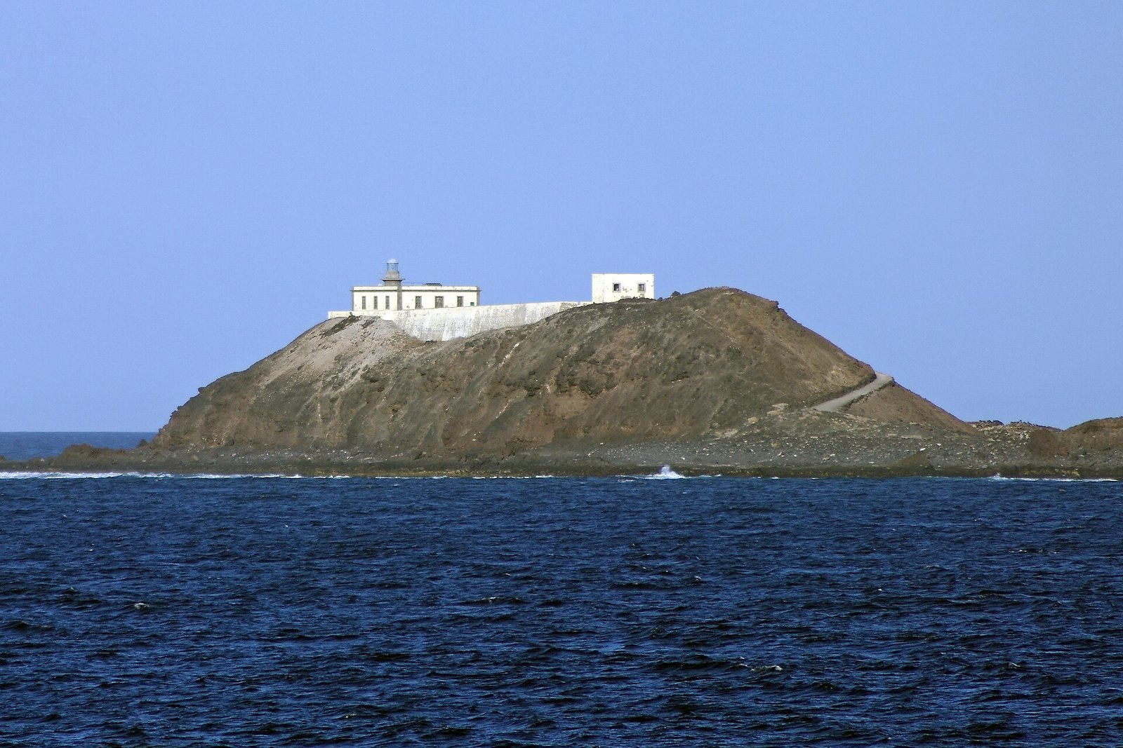 Aerial view of the volcanic cone and pristine beaches of Islote de Lobos